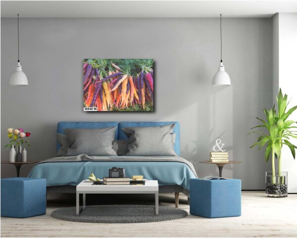 A bedroom with a blue bed and a painting on the wall