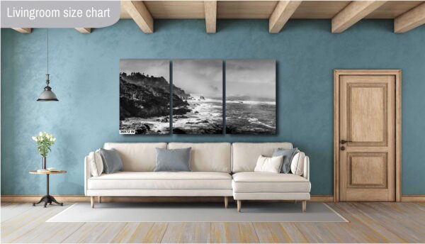 A living room with a couch and a wall hanging