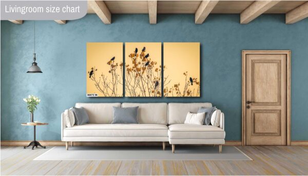 A living room with a couch and some paintings