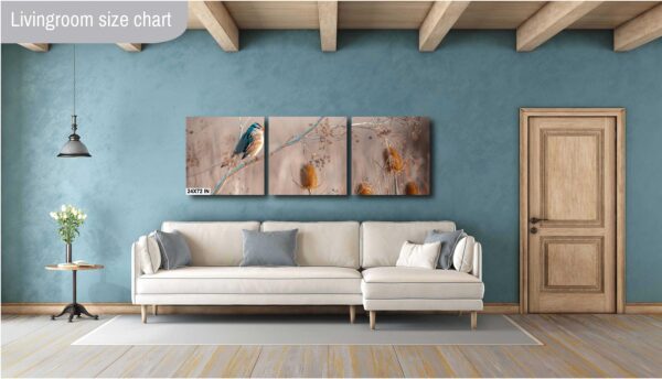 A living room with a couch and wall art