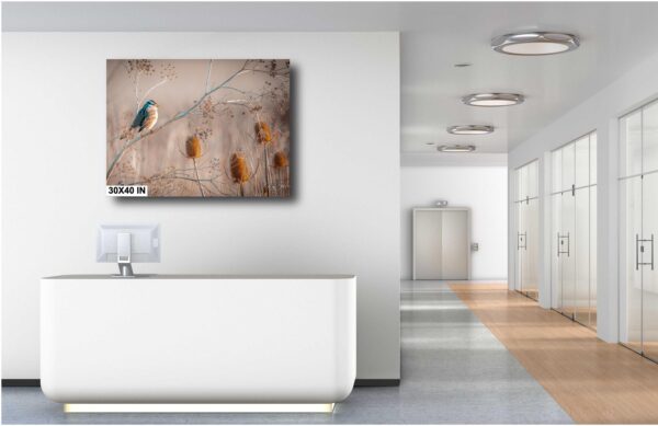 A bathroom with a white tub and a painting on the wall.