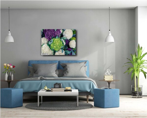 A bedroom with a bed and two tables