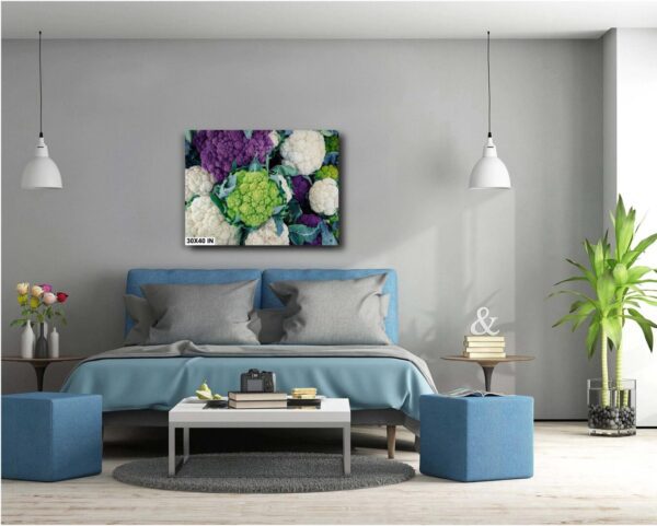 A bedroom with a bed and two tables