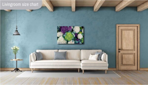 A living room with blue walls and white furniture.