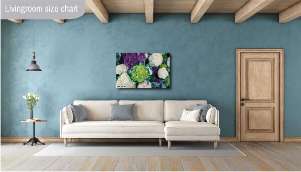 A living room with blue walls and white furniture.