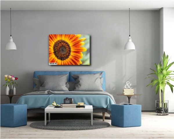 A bedroom with blue walls and a large sunflower.