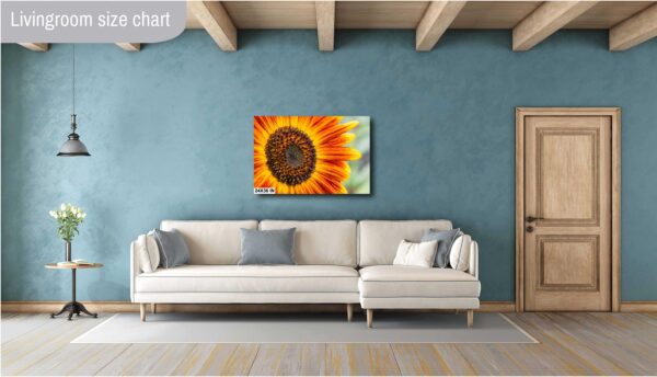 A living room with a couch and a painting on the wall