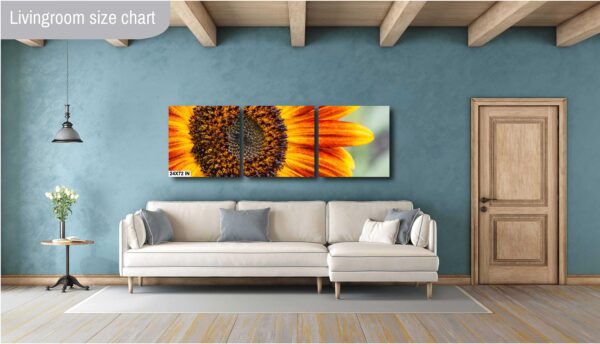 A living room with a couch and a wall hanging
