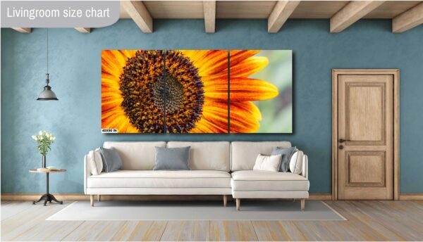A large sunflower sitting on top of a wall.