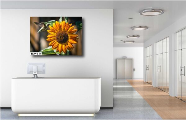 A large sunflower in the middle of a room.